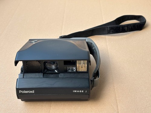 Polaroid image incl - 2,